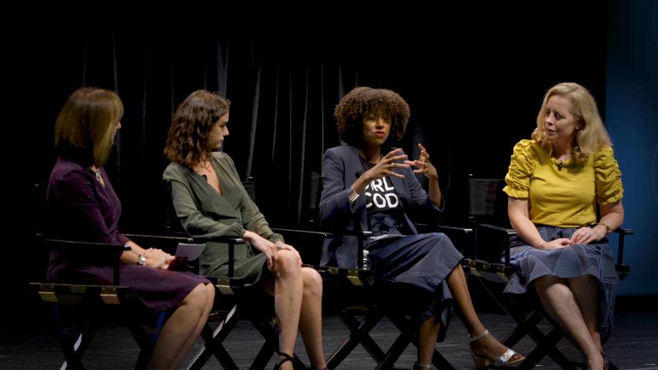 Four women in a discussion