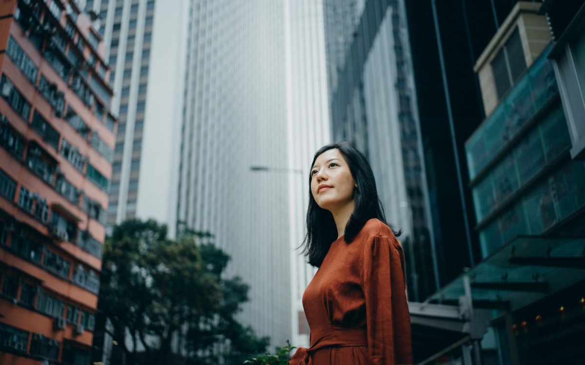 Woman in city landscape