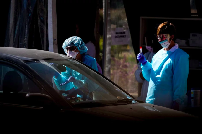 Drive-through testing. Credit: Bloomberg