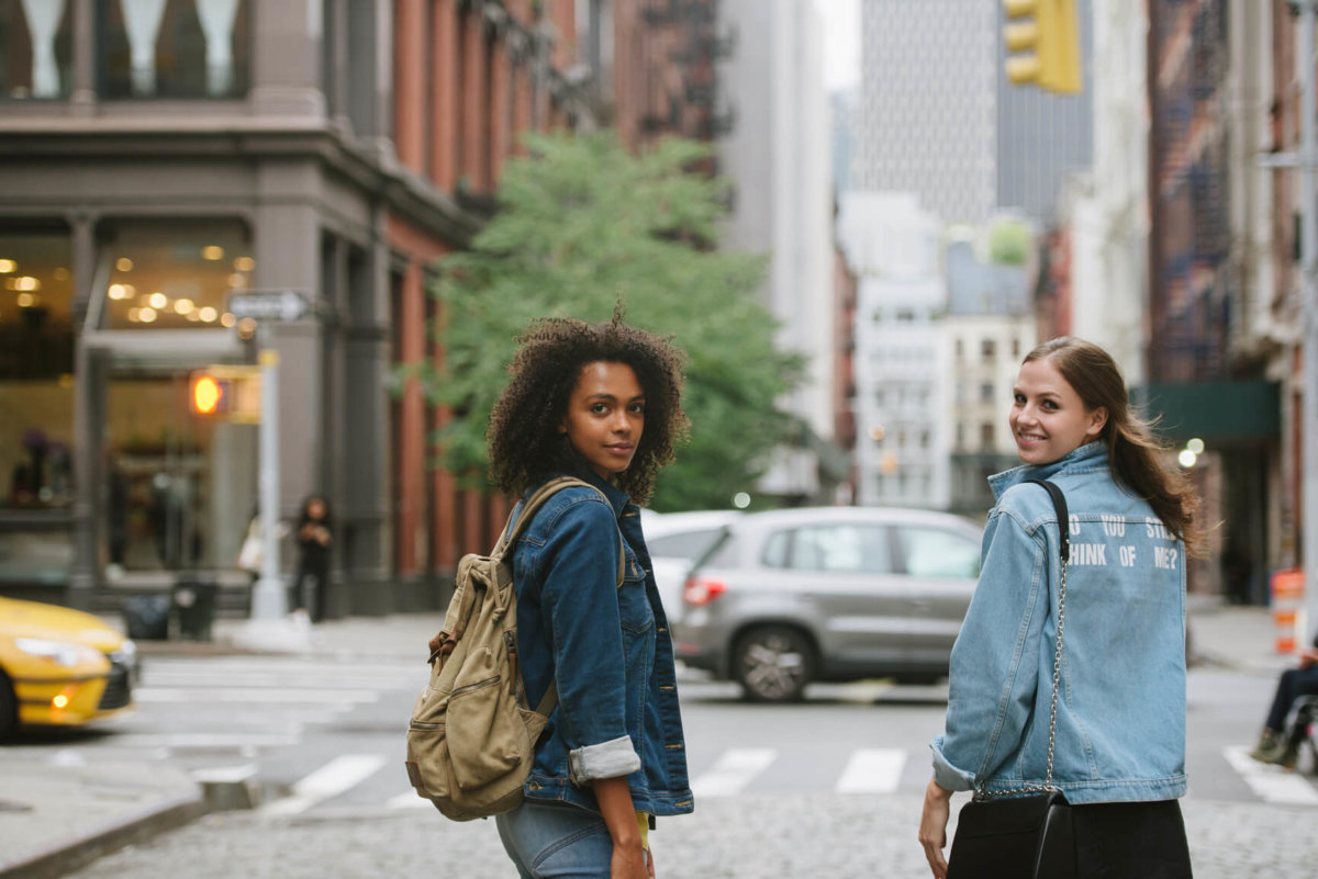 Two women in street urban environment
